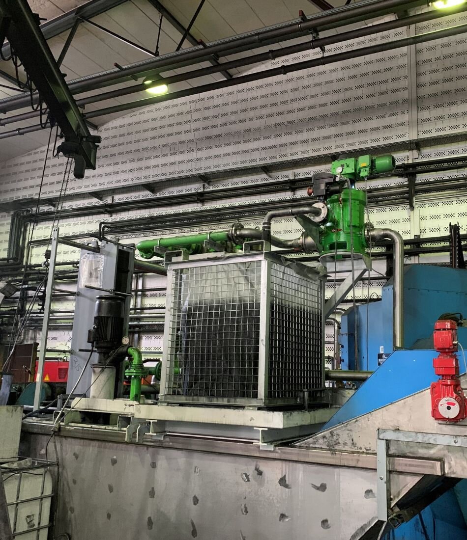 Sludge dewatering device for industrial filters
